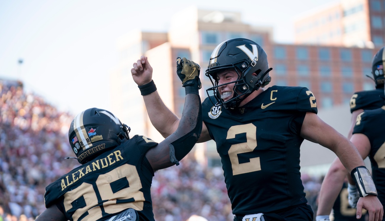 Vanderbilt QB Diego Pavia celebrates with a teammate during a win over Alabama.